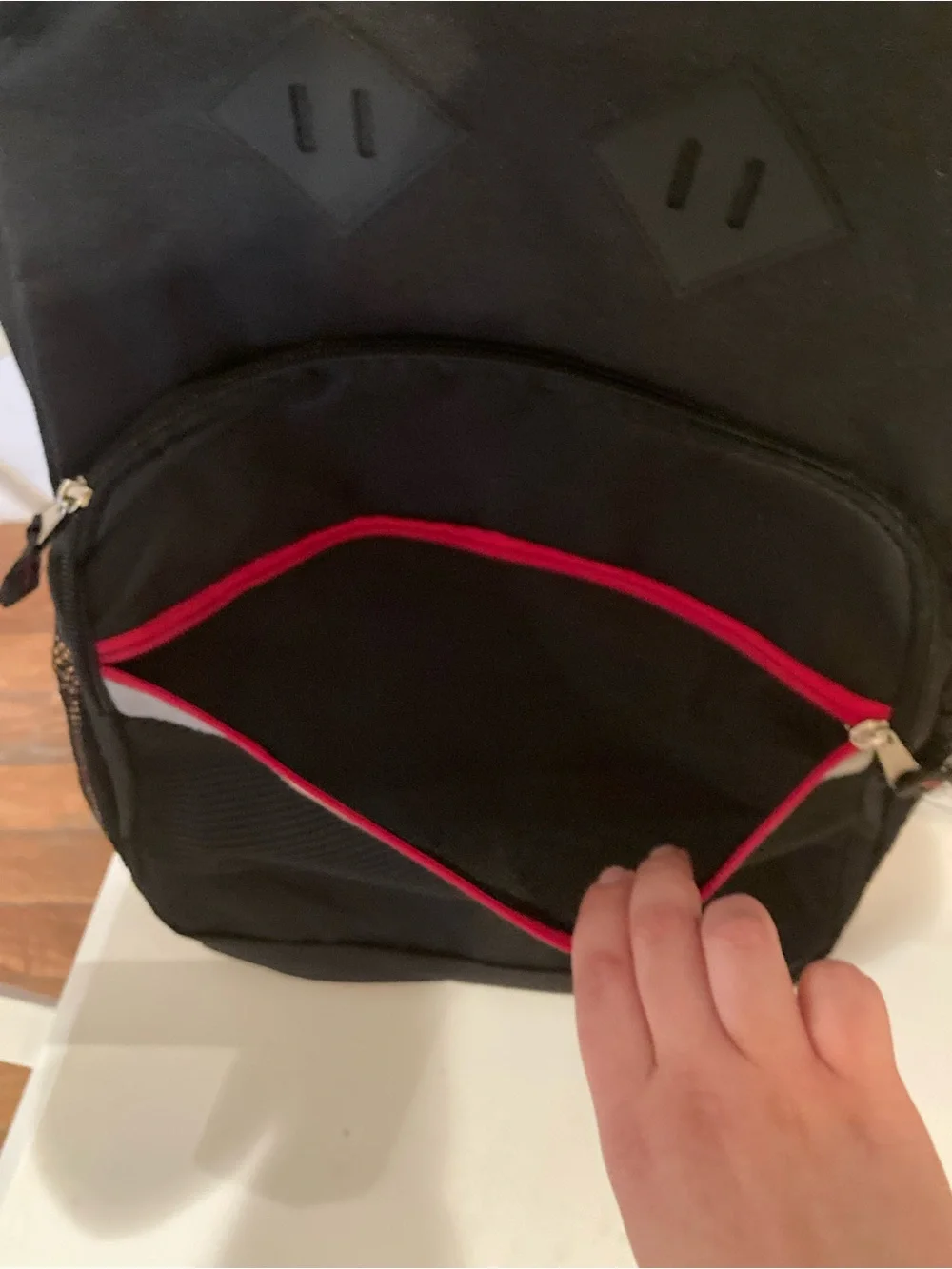 Black Backpack with Reflective Stripe & Red Accent